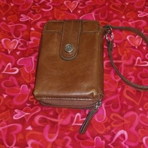 Wristlet wallet. By Relic, fossil.